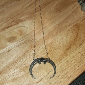 Martha Rotten Golden Eagle Crescent necklace.